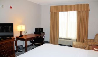 Day room with work desk at Country Inn & Suites By Radisson, BWI Airport.