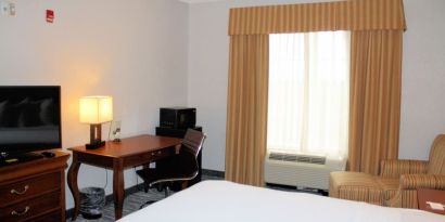 Day room with work desk at Country Inn & Suites By Radisson, BWI Airport.