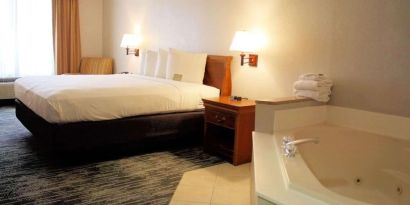 Romantic king room with hot tub at Country Inn & Suites By Radisson, BWI Airport.