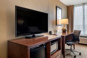 Day room with TV and work station at Comfort Suites Baymeadows Near Butler Blvd.