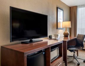 Day room with TV and work station at Comfort Suites Baymeadows Near Butler Blvd.