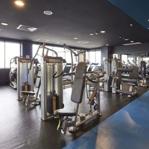 Fitness center at Rydges Sydney Airport Hotel.