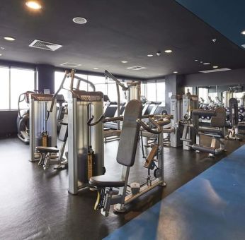 Fitness center at Rydges Sydney Airport Hotel.