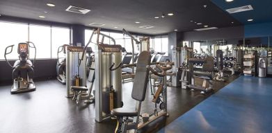 Fitness center at Rydges Sydney Airport Hotel.