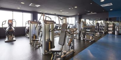 Fitness center at Rydges Sydney Airport Hotel.