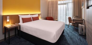 Romantic king room at Rydges Sydney Airport Hotel.