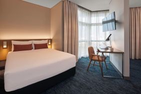 Spacious king room at Rydges Sydney Airport Hotel.