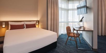 Spacious king room at Rydges Sydney Airport Hotel.