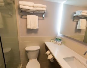 Guest bathroom with shower at Holiday Inn Express Edmonton Downtown.