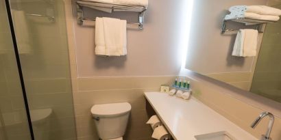 Guest bathroom with shower at Holiday Inn Express Edmonton Downtown.