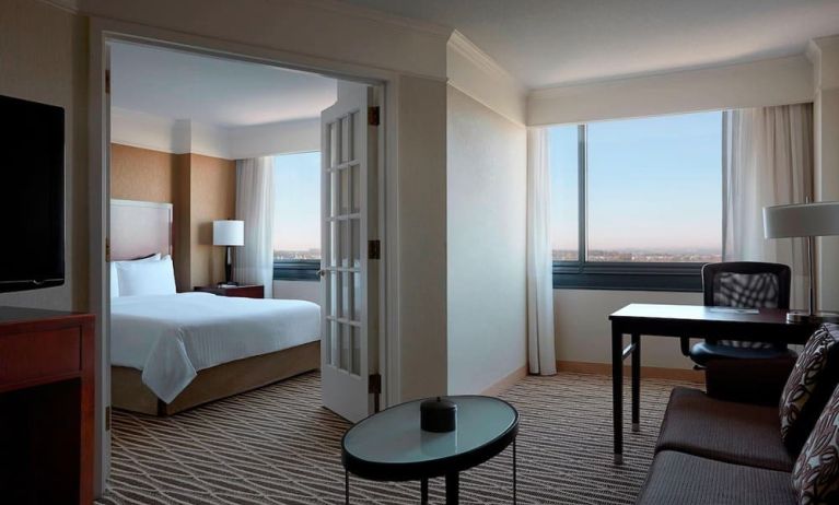 Spacious king suite with lounge area at Washington Dulles Marriott Suites.