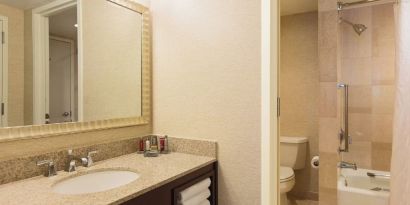 Guest bathroom with shower at Washington Dulles Marriott Suites.