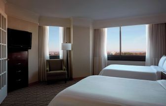 Day room with two queen beds at Washington Dulles Marriott Suites.