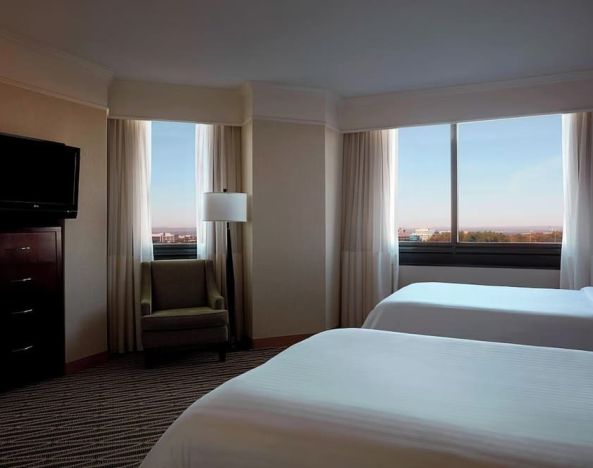 Day room with two queen beds at Washington Dulles Marriott Suites.