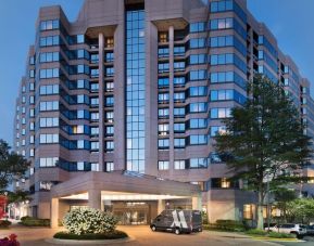 Hotel exterior at night at Washington Dulles Marriott Suites.