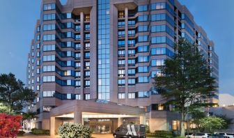 Hotel exterior at night at Washington Dulles Marriott Suites.