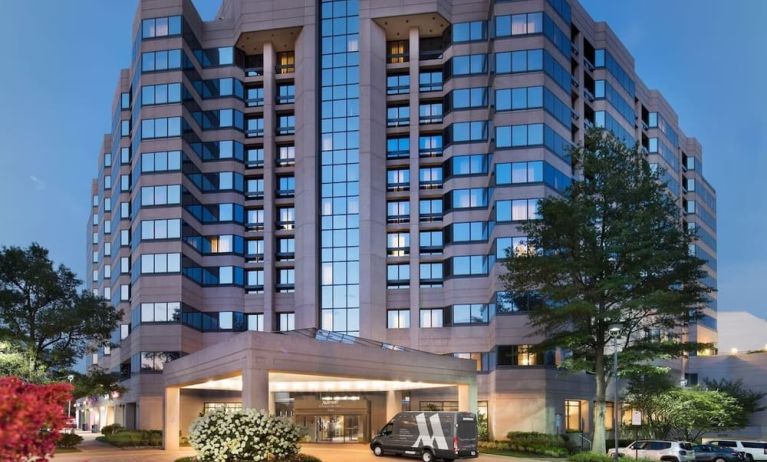 Hotel exterior at night at Washington Dulles Marriott Suites.