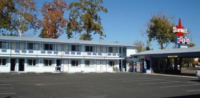 Hotel parking at Stardust Motel Redding.