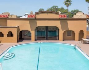 Outdoor pool at Days Inn By Wyndham St Augustine/Historic Downtown.