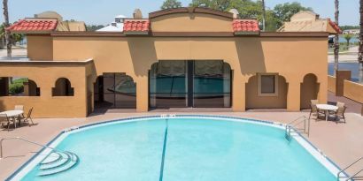 Outdoor pool at Days Inn By Wyndham St Augustine/Historic Downtown.