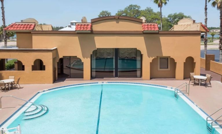 Outdoor pool at Days Inn By Wyndham St Augustine/Historic Downtown.