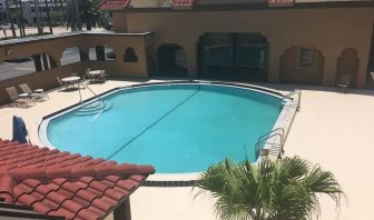 Outdoor pool area at Days Inn By Wyndham St Augustine/Historic Downtown.