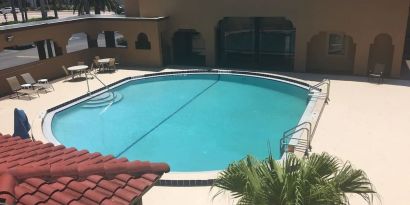 Outdoor pool area at Days Inn By Wyndham St Augustine/Historic Downtown.