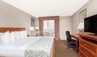 Day use room with TV and work desk at Days Inn By Wyndham St Augustine/Historic Downtown.