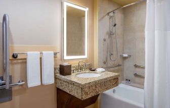 Guest bathroom with shower at Hyatt Regency Greenwich.