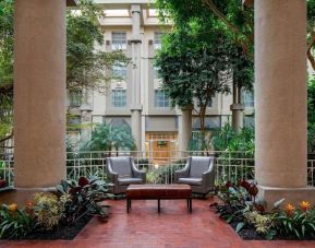 Lounge chairs in green lobby at Hyatt Regency Greenwich.