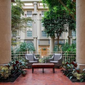 Lounge chairs in green lobby at Hyatt Regency Greenwich.