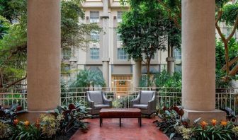 Lounge chairs in green lobby at Hyatt Regency Greenwich.