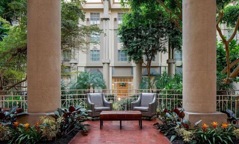 Lounge chairs in green lobby at Hyatt Regency Greenwich.