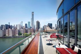 Outdoor terrace with city views at Graduate By Hilton New York.