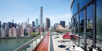 Outdoor terrace with city views at Graduate By Hilton New York.