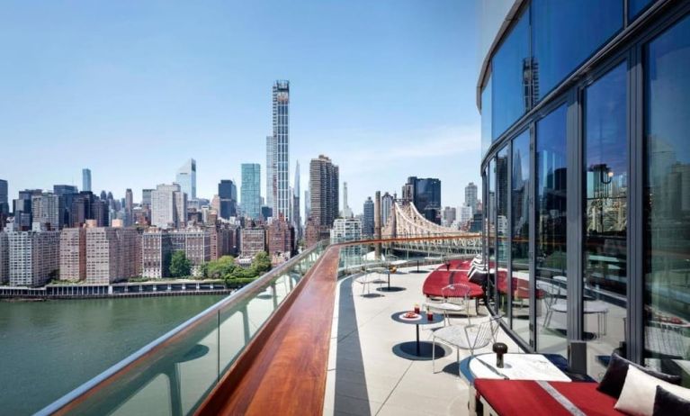 Outdoor terrace with city views at Graduate By Hilton New York.