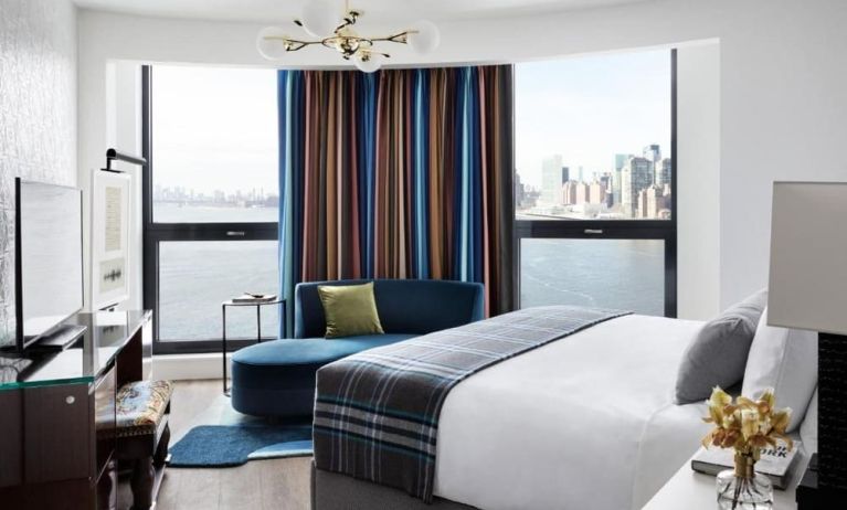 King room with natural light and city views at Graduate By Hilton New York.