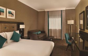 King room with TV at DoubleTree By Hilton Woking.