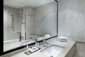 Guest bathroom with shower at DoubleTree By Hilton Woking.