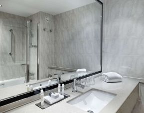 Guest bathroom with shower at DoubleTree By Hilton Woking.