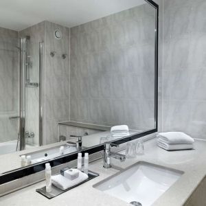 Guest bathroom with shower at DoubleTree By Hilton Woking.