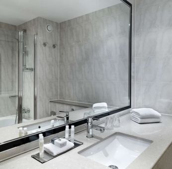 Guest bathroom with shower at DoubleTree By Hilton Woking.