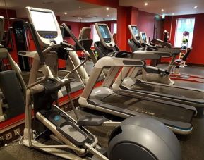 Fitness center at DoubleTree By Hilton Woking.