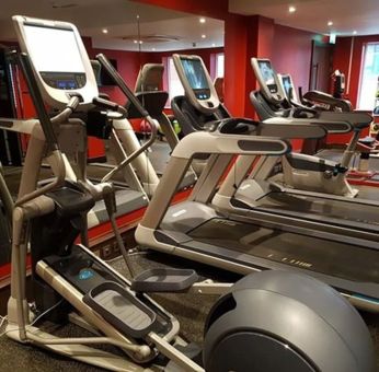 Fitness center at DoubleTree By Hilton Woking.