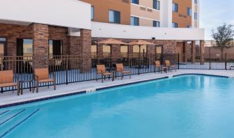 Refreshing outdoor pool at Courtyard By Marriott Houston North/ Shenandoah.