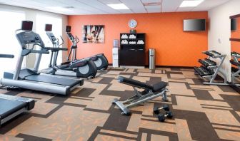 Fitness center available at Courtyard By Marriott Houston North/ Shenandoah. 