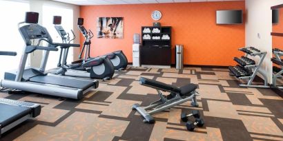 Fitness center available at Courtyard By Marriott Houston North/ Shenandoah. 