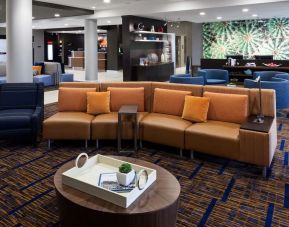 Lobby and coworking lounge at Courtyard By Marriott Houston North/ Shenandoah.