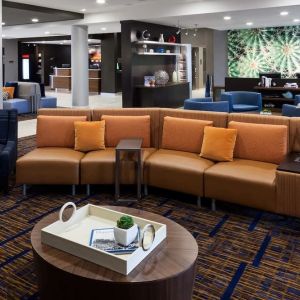 Lobby and coworking lounge at Courtyard By Marriott Houston North/ Shenandoah.