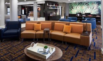 Lobby and coworking lounge at Courtyard By Marriott Houston North/ Shenandoah.